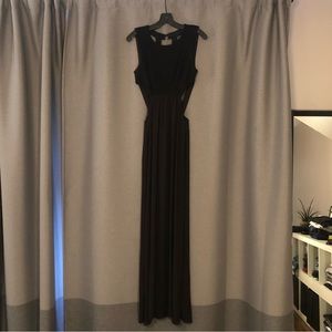 BCBG Floor length black gown with cutout sides and back